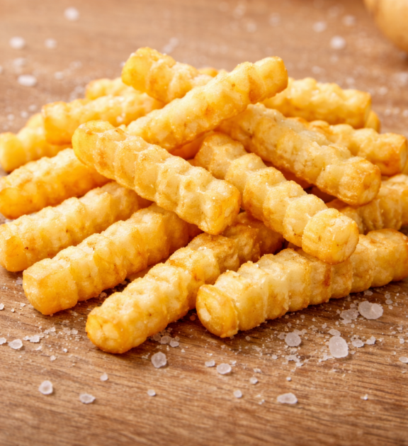 Empiric Exim’s Crinkle Cut French Fries are crafted from carefully selected premium-grade potatoes to deliver a perfect balance of crispy ridges and fluffy interiors. The unique crinkle-cut shape not only enhances visual appeal but also holds seasonings and sauces exceptionally well, making them a favorite across quick-service restaurants, hotels, and foodservice outlets worldwide.