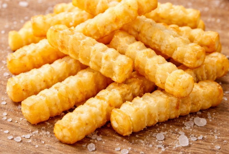 Empiric Exim’s Crinkle Cut French Fries are crafted from carefully selected premium-grade potatoes to deliver a perfect balance of crispy ridges and fluffy interiors. The unique crinkle-cut shape not only enhances visual appeal but also holds seasonings and sauces exceptionally well, making them a favorite across quick-service restaurants, hotels, and foodservice outlets worldwide.